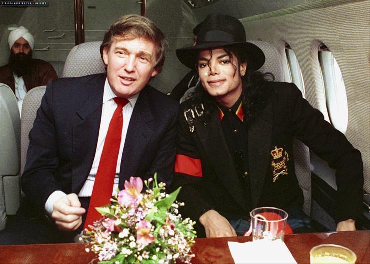 1990.04.01 - Michael and Donald Trump on a private plane ready to fly off to meet ... - michael-and-dona...ryan-white46-m-4.jpg
